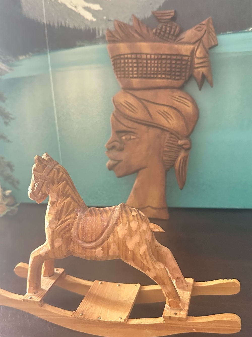 Hand Carved Woman With Basket and wood horse